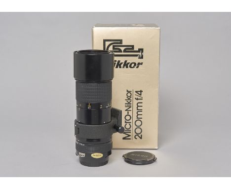 A Nikon Micro-Nikkor 200mm f/4 Lens, serial no.178394, AI, black, barrel VG, elements VG, light  water-like marks to front el