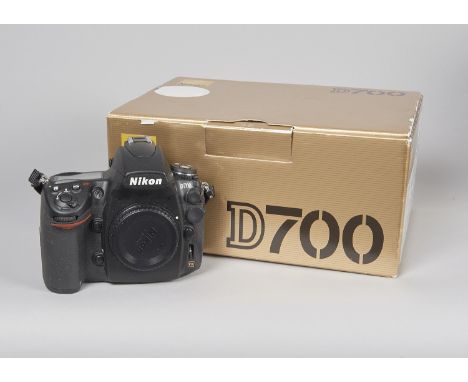 A Nikon D700 DSLR Body, serial no. 2481912, untested, body, E, with Nikon charger and 2 batteries, with some paperwork, all i