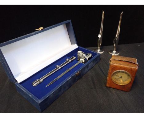 A POOLEY SWORD, LONDON MINIATURE SWORD LETTER OPENER with metal scabbard, cased, a 'COSMOS' electric clock, leather cased, an