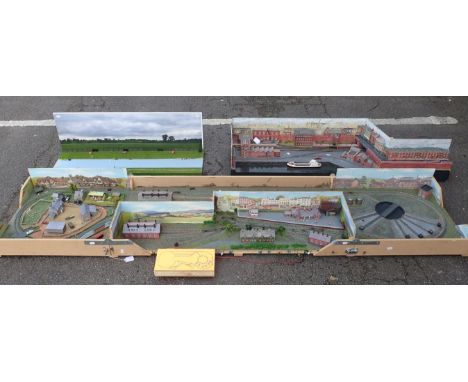 TWO N GAUGE MODEL RAILWAY LAYOUTS one designed for transportation, urban and industrial settings, with a section of canal lay