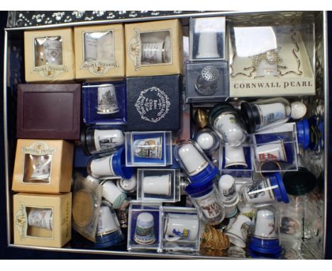A COLLECTION OF DECORATED THIMBLES mostly ceramic, some boxed