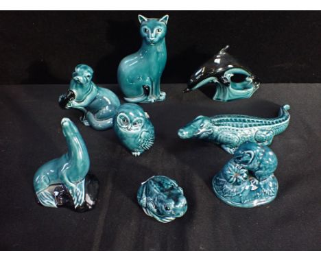 POOLE POTTERY: EIGHT BLUE-GLAZED ANIMALS including cat, dolphin, otter, crocodile and others