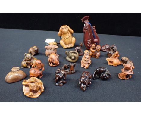 A COLLECTION OF JAPANESE BOXWOOD NETSUKE (19) to include rabbits, pis and tortoise, some signed and two carved inro, one a mo