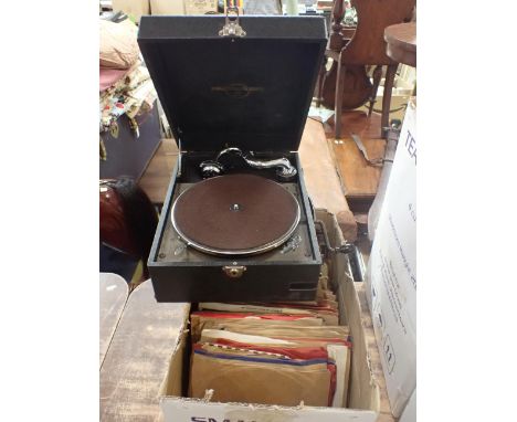 A COLUMBIA 204 PORTABLE 'GRAFONOLA' GRAMOPHONE (running) with a collection of 78rpm records