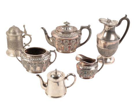 A VICTORIAN SILVER PLATED THREE PIECE TEA SERVICE by Walker &amp; Hall, with rosette and panelled bodies, four other silver p