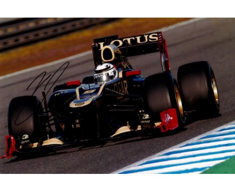 Motor Racing Kimi Raikkonen signed Lotus Formula One 12x8 colour photo. The Iceman is a Finnish racing driver who competed in