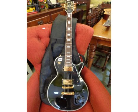 Reproduction Gibson Les Paul Standard Guitar in Black Beauty finish with mother of pearl inlay and a sleeve case