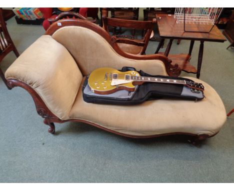 Victorian Scroll backed walnut framed chaise longue with cream upholstery, supported on cabriole legs with ceramic casters