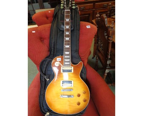 Reproduction Gibson Les Paul Standard Guitar in flame top finish with mother of pearl inlay and a sleeve case