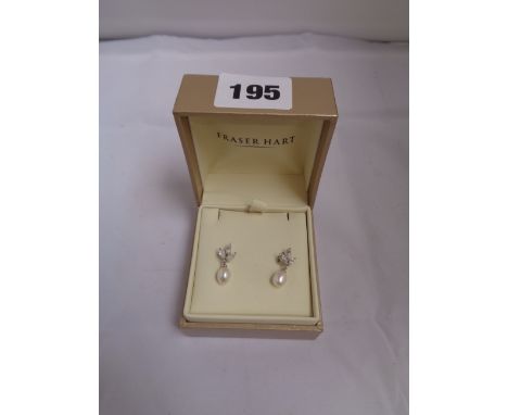 Boxed Fraser Hart Cultured Pearl Pr. Of earrings with white stone setting in 9ct white Gold with receipt for £135