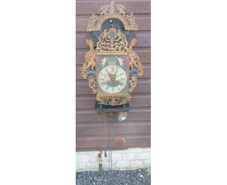 DUTCH WALL CLOCK WITH A TWO TRAIN WEIGHT DRIVEN MOVEMENT ON A BRACKET WITH ARCHED CANOPY (H: 81 cm INCLUDING BRACKET)