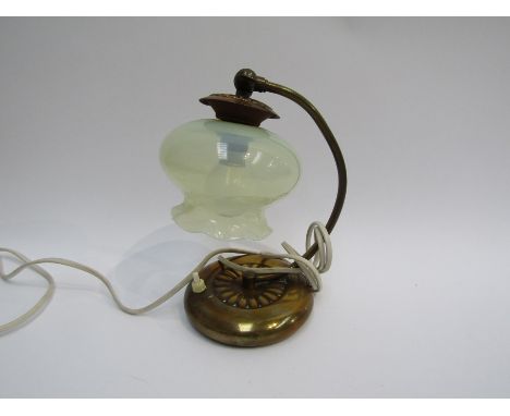 An Art Nouveau brass electric table lamp with Vaseline glass frilled shade