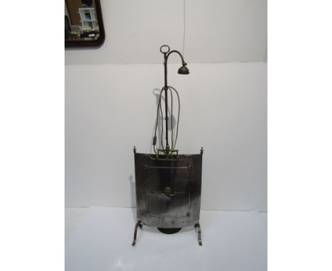 A curved metal fire guard with brass mounts. a/f. A telescopic metal floor-standing electric lamp (no shade) (2)