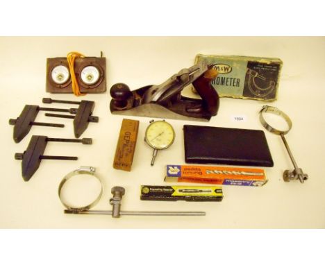A woodworking plane and various tools 