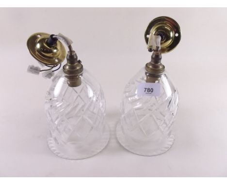 A pair of Edwardian cut glass light fittings