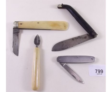 An old ivory handled penknife, an ivory handled tool and an ebony folding knife