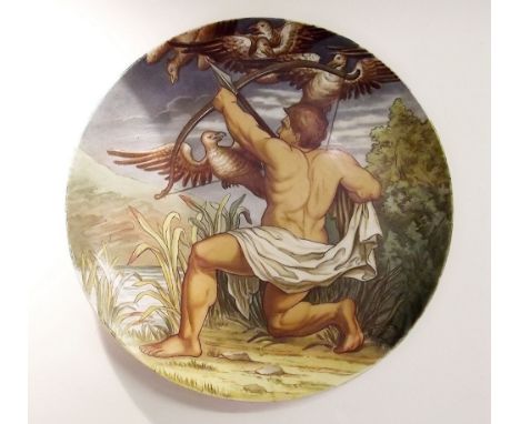 A Howell and James Art Pottery exhibition charger painted Hercules Slaying the Stymphalian, monogram J R and paper label to v