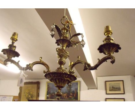 A gilt metal three branch light fitting 