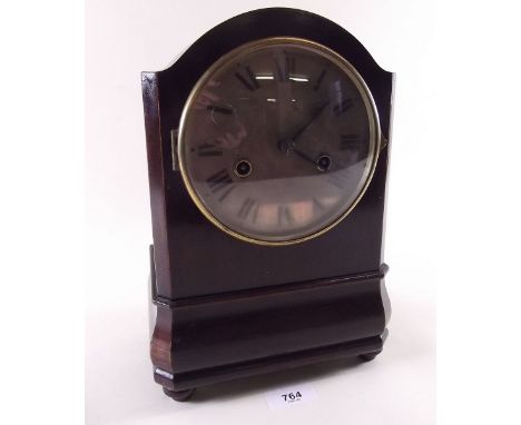 An early 20th century mahogany cased striking mantel clock 