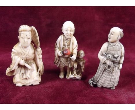 Three carved ivory 19th century Japanese netsuke figures - signed 