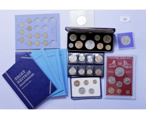 Collection of partially filled coin folder for pennies, halfpennies (filled) brass threepences, Britain's first decimal coins