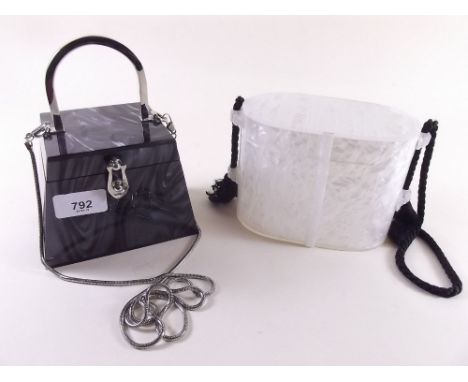 An American vintage plastic handbag and a black plastic one 