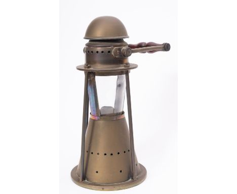 A brass circular hand lantern, maker Bulpitt & Sons,  wooden swing handle over domed chimney and clear glass lens enclosing a