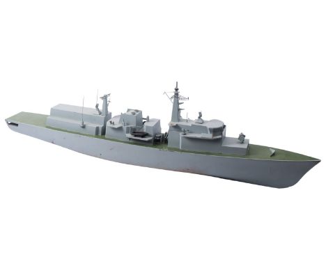 A scale reference model of a Royal Navy frigate, fitted areal masts, radar array, forward missile emplacement, torpedo tubes 