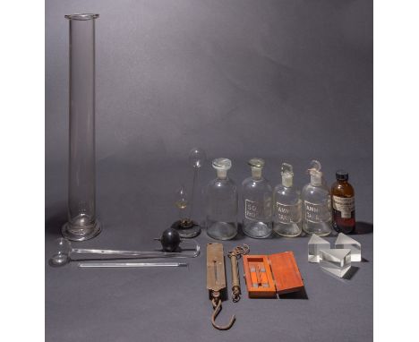Two Leslie differential air thermometers, both unsigned, together with three glass prisms, two pairs of scales, a collection 
