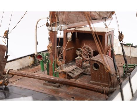 A scale model of the  sailing barge, 'Invicta': fully rigged over a simulated planked deck with wheel house, vents, cargo  gr
