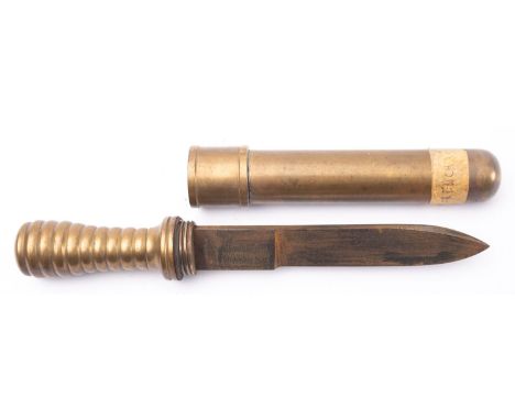 A 20th Century brass and steel diver's knife, possibly French, 7 3/4 single edge blade over ribbed handle in brass scabbard w