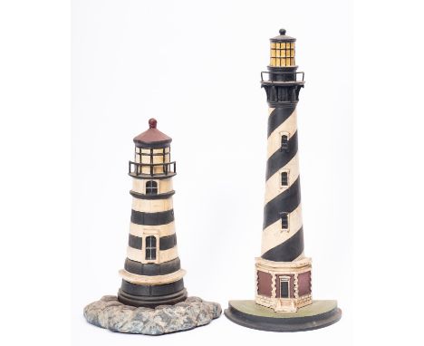 Two cast iron light house door stops, one in the form of Cape Hatteras Light, North Carolina, one 54cm high and the other 37.