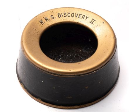 RRS 'Discovery II'. A circular brass mounted iron ashtray, inscribed as per title to the rim, 10.5cm diameter. * Notes- Built