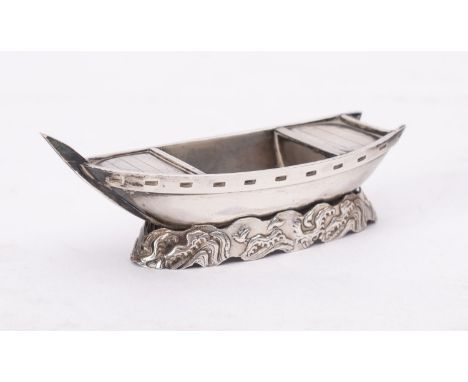 A Chinese silver  model of a rowing boat, 18.2g, 7.3cm long.
