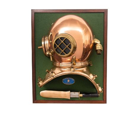 A display mounted half section 12-bolt square corselet helmet by C E Heinke & Co Ltd, London, and a Seibe Heinke diver's knif