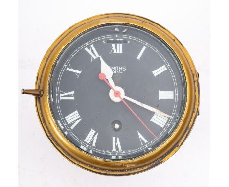 A Smiths  'Astral'  submarine brass bulkhead clock, with black dial , red sweep seconds and Roman numerals signed as per titl