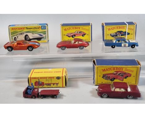 Matchbox Superfast No. 41 Ford GT diecast car in original box, similar Matchbox No. 32 E Type Jaguar, No. 55 New Model Police