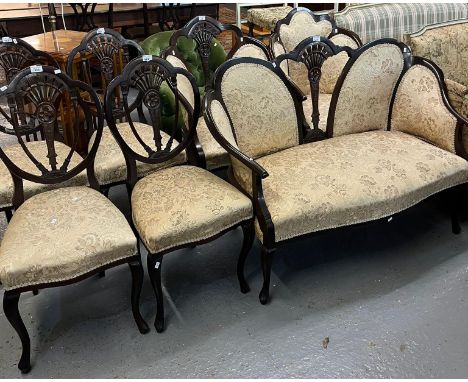 Early 20th century mahogany framed cloud back design parlour suite comprising: two seater sofa, ladies and gentleman's elbow 