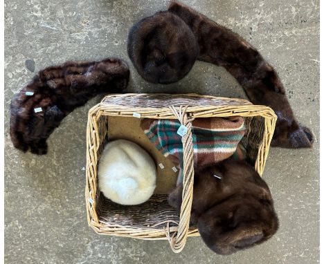 Wicker single handled basket/hamper comprising vintage fur hats and stoles, blanket etc.  (B.P. 21% + VAT) 