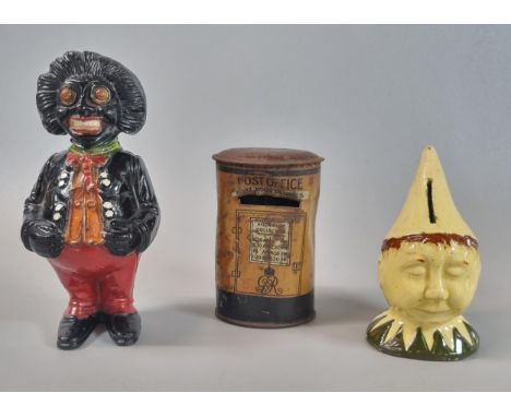 Group of moneyboxes to include: cast metal standing golly, tinplate George V letterbox and slip glazed Dunce boy's head. (3) 