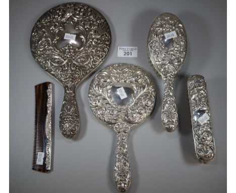 Edwardian design silver ladies vanity set comprising: two hand brushes, two hand mirrors and a comb.   (B.P. 21% + VAT) 