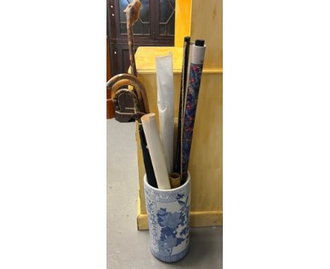 Modern Chinese design blue and white stick stand containing assorted walking sticks, architectural plans, wall hanging etc.  