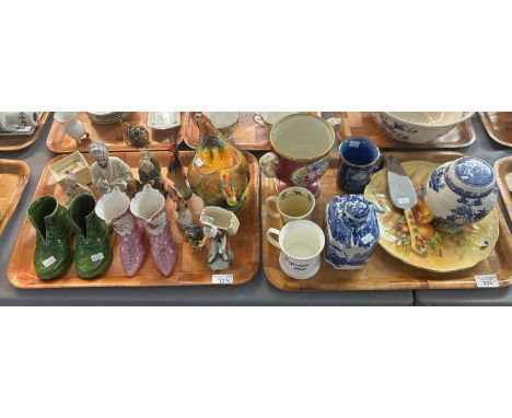 Two trays of ceramics to include: teapot in the form of a rooster, Chinese Mudmen figures, continental boots, set of four Roy