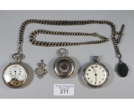 An early 20th century French eight days enamel open faced pocket watch with exposed movement and silver T bar chain with bloo