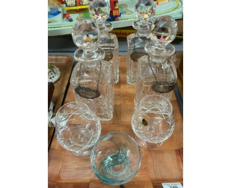 Tray of glass to include: four similar square shaped decanters and stoppers with silver plated decanter labels Brandy, Gin, W