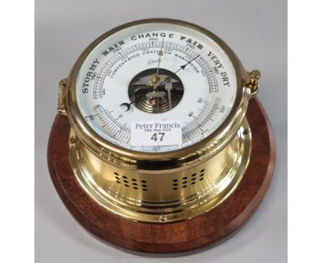 Modern Shatz brass bulkhead type 'compensation precision barometer' on wooden plaque.  The face 15cm diameter approx.  (B.P. 