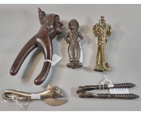 Collection of assorted nut crackers etc. to include: German wooden Monk's head, brass elephant and Mahout, pair of steel with