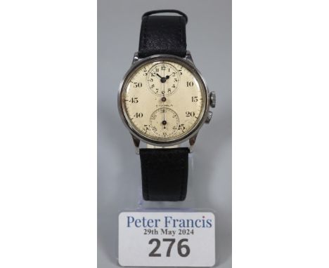 Eterna steel gentleman's regulator style wristwatch with single button  sweep seconds hand and two additional dials.  (B.P. 2