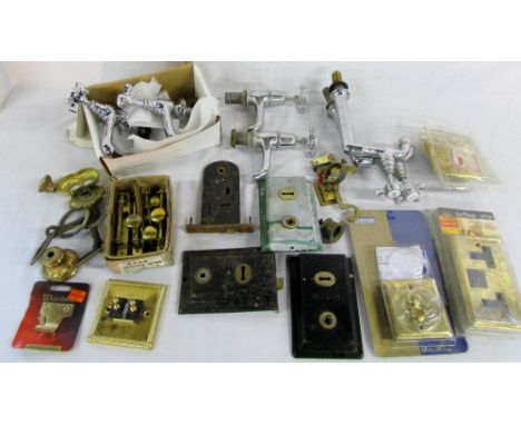 Various taps, brass light fittings, bolts etc