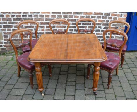 Victorian dining table (with extra leaf) and 6 balloon back chairs with leather button seats